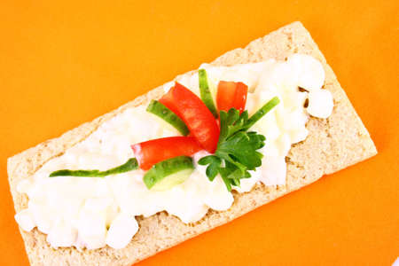 A healthy sandwich with tomato green and red vegetablesの写真素材