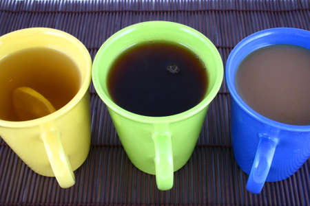 A beautiful cup on white background with coffee and teaの写真素材