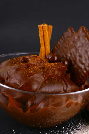 a ripe brown cinnamon in chocolate dipping sauce.の写真素材