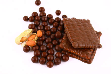 black and brown chocolate sweets against white backgroundの写真素材