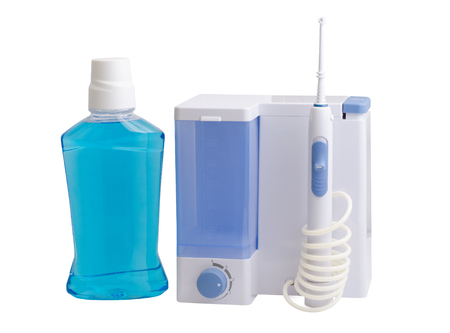 Dental equipment care. Irrigator for mouth. Isolated on whiteの写真素材