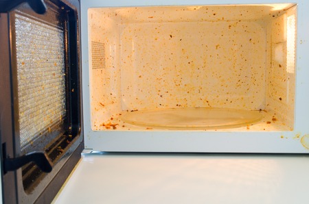 Open microwave. Dirt from food insideの写真素材