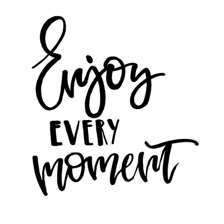 Enjoy every moment. Handwritten text. Modern calligraphy. Isolated on whiteの写真素材