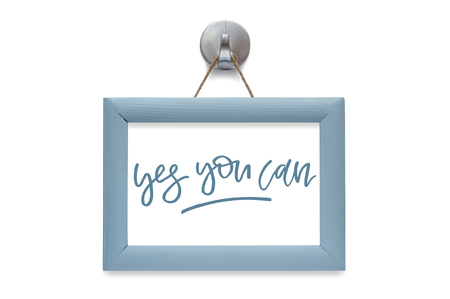 Yes you can. Modern calligraphy. Motivational quote. Blue photo frame. Isolated on whiteの写真素材