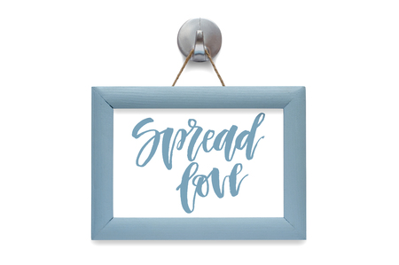 Spread love. Modern calligraphy. Motivational quote. Blue photo frame - isolated on whiteの写真素材