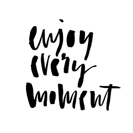 Enjoy every moment. Handwritten text. Modern calligraphy. Inspirational quote. Isolated on whiteの写真素材