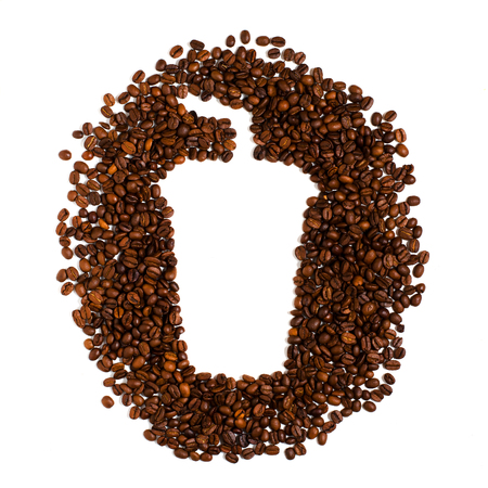 Roasted coffee beans on white background. Space for text in the shape of a coffee plastic Cupの写真素材