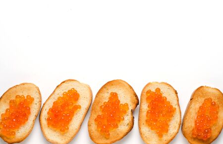 Sandwiches with red caviar of salmon fishes. Flat Lay. Copy spaceの写真素材