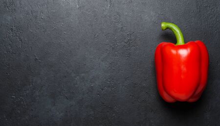 Red pepper on a black background. Paprika. The species capsicum annuum. Copy space.の写真素材