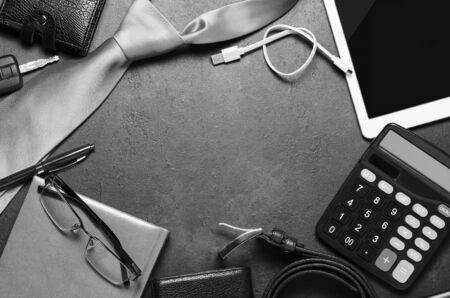 Men's accessories on a black concrete background. The concept of the celebration father's day. Copy space.の写真素材