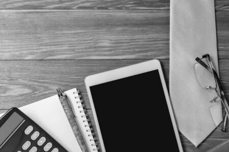 Mens accessories and necktie on a wooden background. The concept of the image of a modern successful person. Copy spaceの写真素材