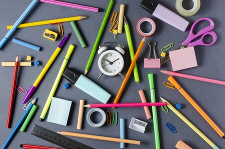 Childrens accessories for study, creativity and office supplies on dark background. Back to school conceptの写真素材