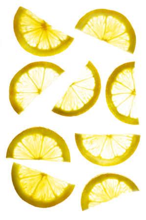 Transparent lemon slices on a white background. Top viewの写真素材