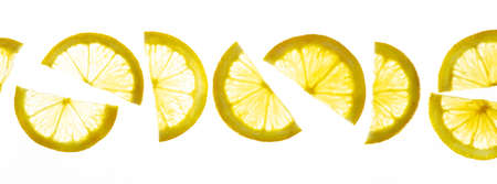 Transparent lemon slices on a white background. Top view