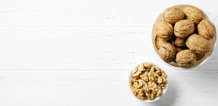 Walnuts on a white background. Nut - a source of vitamins and useful trace elements. Flat top viewの写真素材