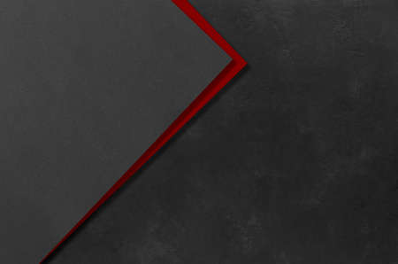 Black and red rectangular mockups on a dark concrete background. Design elements or portfolio. Copy space.の写真素材