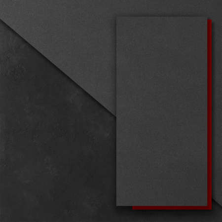 Black and red rectangular mockups on a dark concrete background. Design elements or portfolio. Copy space.の写真素材