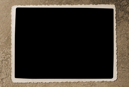 An old photo on a concrete background. Copy spaceの写真素材