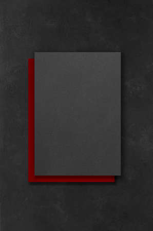 Black and red rectangular mockups on a dark concrete background. Design elements or portfolio. Copy spaceの写真素材