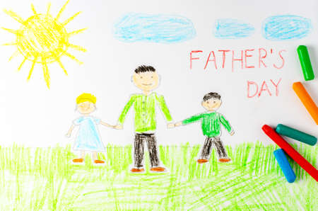 Father, son and daughter are depicted in a childrens drawing. The inscription fathers Day.の写真素材