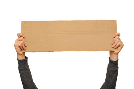 Posters of cardboard in his hands. Isolated on white. Copy space.の写真素材