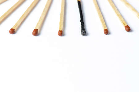 Burnt matches on a white background. The concept of burnout syndrome at work. Copy space.の写真素材