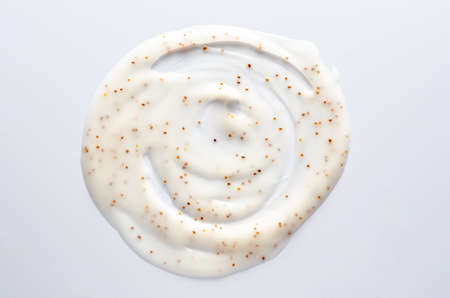 A sample of a hand scrub based on jojoba oil. Cosmetic product for moisturizing and cleansing the skinの写真素材