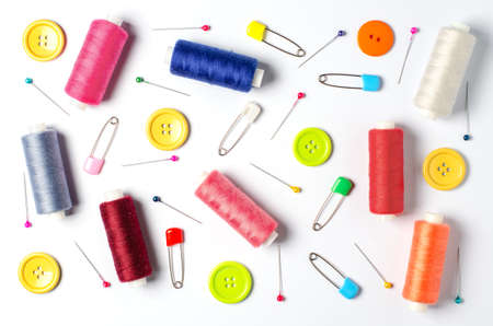 Accessories for sewing on a white background. Closeup.