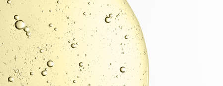 The texture of a cosmetic serum with bubbles in closeup. Macrophotography