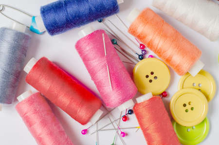 Accessories for sewing on a white background. Closeup.の写真素材