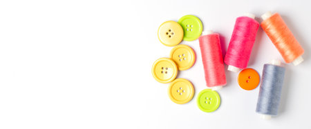 Accessories for sewing on a white background. Closeup. Copy space