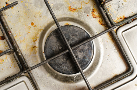 Dirty gas stove. The concept of cleaning in the kitchenの写真素材