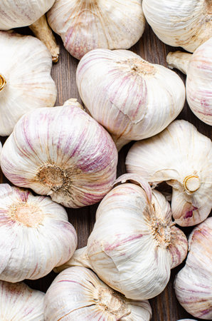 Background of garlic bulbs. Close-up. Harvest seasonの写真素材