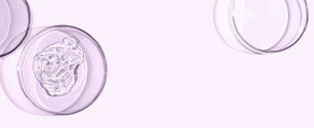 A sample of skin serum or moisturizing gel in a Petri dish. Copy space