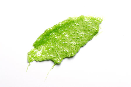 A sample of a cosmetic body care scrub. White background