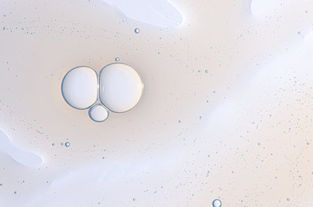 Textured background of cosmetic moisturizing gel or skin serum