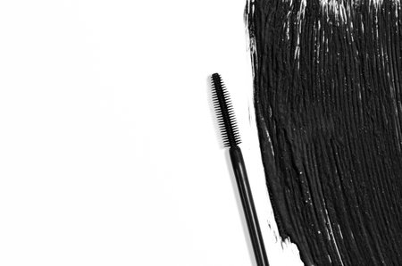 The texture of black mascara and an eyelash brush. Copy spaceの写真素材