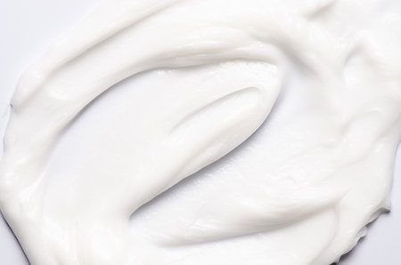 The texture of a cosmetic cream or balm