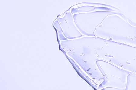 The texture of a moisturizing cosmetic gel or skin serum. Copy space.