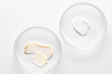 A sample of cosmetic moisturizing or anti-aging cream in a petri dish