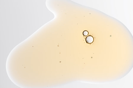 Textured background of cosmetic moisturizing gel or skin serumの写真素材