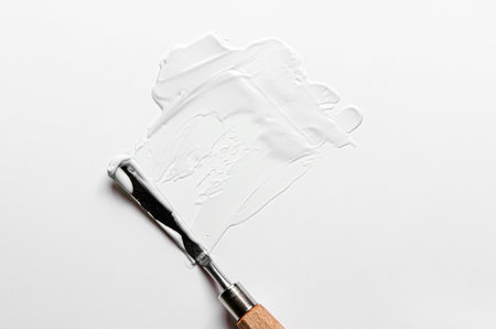 The texture of moisturizer with palette knife.