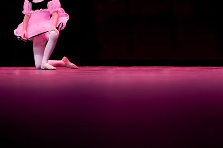 Performing on stage, a dancer is by herselfの写真素材