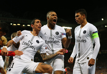 MANCHESTER, ENGLAND - FEBRUARY 12 2019: Presnel Kimpembe of PSG celebrates scoring a goal during the Champions League match between Manchester United and Paris Saint-Germain at Old Trafford Stadium.のeditorial素材