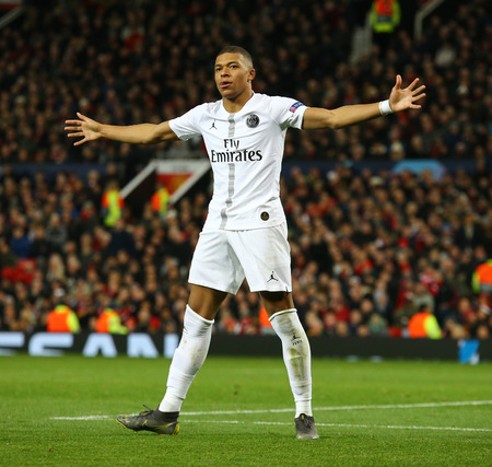 MANCHESTER, ENGLAND - FEBRUARY 12 2019: Kylian Mbappe of PSG celebrates scoring a goal during the Champions League match between Manchester United and Paris Saint-Germain at Old Trafford Stadium.のeditorial素材