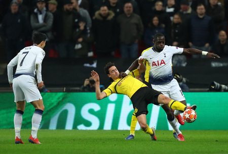 LONDON, ENGLAND - FEBRUARY 13 2019: Thomas Delaney of Dortmund and Moussa Sissoko of Tottenham compete for the ball during the Champions League match between Tottenham Hotspur and Borussia Dortmund at Wembley Stadium, London.のeditorial素材