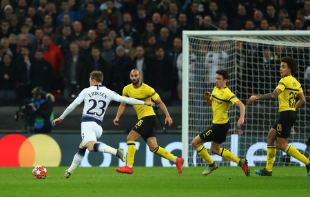 LONDON, ENGLAND - FEBRUARY 13 2019: Christian Eriksen of Tottenham takes a shot during the Champions League match between Tottenham Hotspur and Borussia Dortmund at Wembley Stadium, London.のeditorial素材