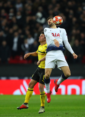 LONDON, ENGLAND - FEBRUARY 13 2019: Thomas Delaney of Dortmund and Fernando Llorente of Tottenham during the Champions League match between Tottenham Hotspur and Borussia Dortmund at Wembley Stadium, London.のeditorial素材