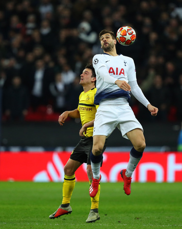 LONDON, ENGLAND - FEBRUARY 13 2019: Thomas Delaney of Dortmund and Fernando Llorente of Tottenham during the Champions League match between Tottenham Hotspur and Borussia Dortmund at Wembley Stadium, London.のeditorial素材