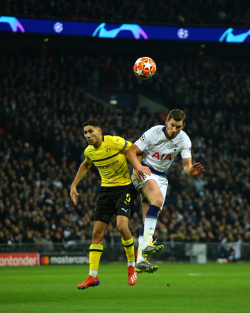 LONDON, ENGLAND - FEBRUARY 13 2019: Achraf Hakimi of Dortmund and Jan Vertonghen of Tottenham during the Champions League match between Tottenham Hotspur and Borussia Dortmund at Wembley Stadium, London.のeditorial素材